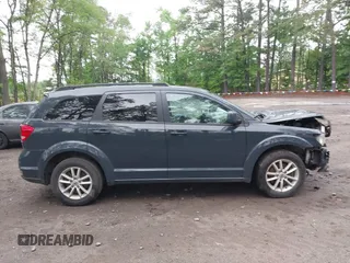 2018 Dodge Journey SXT z VIN 3C4PDCBB7JT409958, wystawiony jako IAAI lot #42200397 z przebiegiem 146 306 mil mil oraz . Historia ofert i sprzedaży dostępna na DreamBid. Obrazek 14.