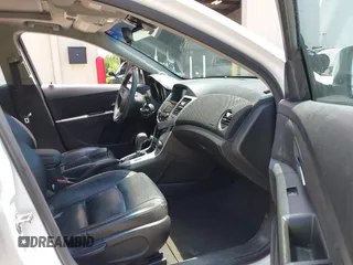 2014 Chevrolet Cruze 2LT z VIN 1G1PE5SB7E7115794, wystawiony jako IAAI lot #42271519 z przebiegiem 160 369 mil mil oraz . Historia ofert i sprzedaży dostępna na DreamBid. Obrazek 5.