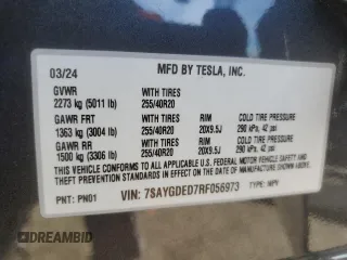 2024 Tesla Model Y with VIN 7SAYGDED7RF056973, listed as a Copart auction lot 87139214 with 15,391 mi miles and Salvage Title. Bid and sale history available at DreamBid. Image 15.
