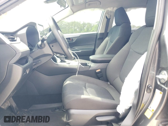 2023 Toyota RAV4 Hybrid LE with VIN JTMLWRFV8PD200078, listed as a Copart auction lot 57490185 with 67,321 mi miles and Salvage title. Bid and sale history available at DreamBid. Image 7.