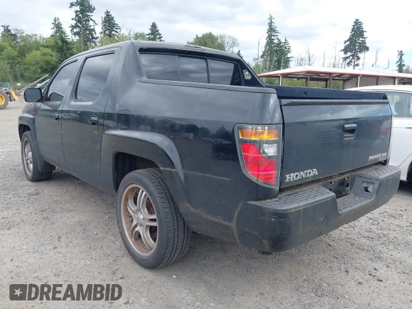2006 Honda Ridgeline RTL with VIN 2HJYK16526H517466, listed as a IAAI auction lot 42737202 with 184,856 mi miles and . Bid and sale history available at DreamBid. Image 3.