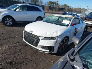 2023 Audi TTS with VIN TRUA1AFV0P1007101, listed as a IAAI auction lot 41800664 with 2,021 mi miles and . Bid and sale history available at DreamBid. Image 2.