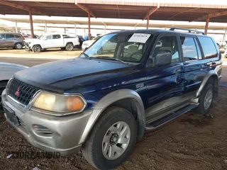2001 Mitsubishi Montero Sport LS with VIN JA4MT31H71P007335, listed as a IAAI auction lot 41465825 with 258,707 mi miles. Bid and sale history available at carsss.com. Image 6.