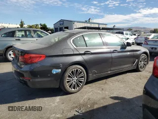 2020 BMW 5 Series 530e with VIN WBAJA9C08LCD44034, listed as a Copart auction lot 63664454 with 97,595 mi miles and Salvage Title. Bid and sale history available at DreamBid. Image 3.
