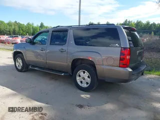 2012 Chevrolet Suburban LT z VIN 1GNSKJE74CR221767, wystawiony jako IAAI lot #42340815 z przebiegiem 219 966 mil mil oraz . Historia ofert i sprzedaży dostępna na DreamBid. Obrazek 14.