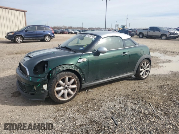 2012 MINI Coupe S z VIN WMWSX3C58CT465767, wystawiony jako Copart lot #88276985 z przebiegiem 113 023 mil mil oraz Szkoda całkowita • Salvage title. Historia ofert i sprzedaży dostępna na DreamBid. Obrazek 1.