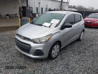 2016 Chevrolet Spark LS with VIN KL8CB6SA3GC587733, listed as a IAAI auction lot 41563025 with 124,324 mi miles. Bid and sale history available at carsss.com. Image 2.