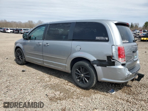 2014 Dodge Grand Caravan SXT with VIN 2C4RDGCG4ER114464, listed as a Copart auction lot 52480965 with 125,212 mi miles and Salvage Title. Bid and sale history available at DreamBid. Image 2.