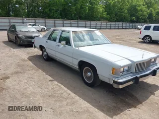 1986 Mercury Grand Marquis z VIN 2MEBP95F2GX642882, wystawiony jako IAAI lot #42227433 z przebiegiem 57 041 mil mil oraz . Historia ofert i sprzedaży dostępna na DreamBid. Obrazek 1.