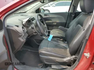 2012 Chevrolet Sonic LTZ with VIN 1G1JE6SH7C4111176, listed as a Copart auction lot 59002575 with 116,640 mi miles and Salvage title. Bid and sale history available at DreamBid. Image 7.