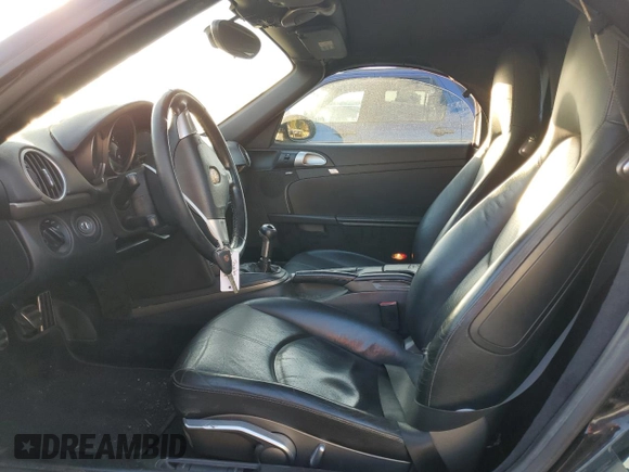 2005 Porsche Boxster z VIN WP0CA29885U711749, wystawiony jako Copart lot #84301684 z przebiegiem 272 856 mil mil oraz Szkoda całkowita • Salvage title. Historia ofert i sprzedaży dostępna na DreamBid. Obrazek 7.