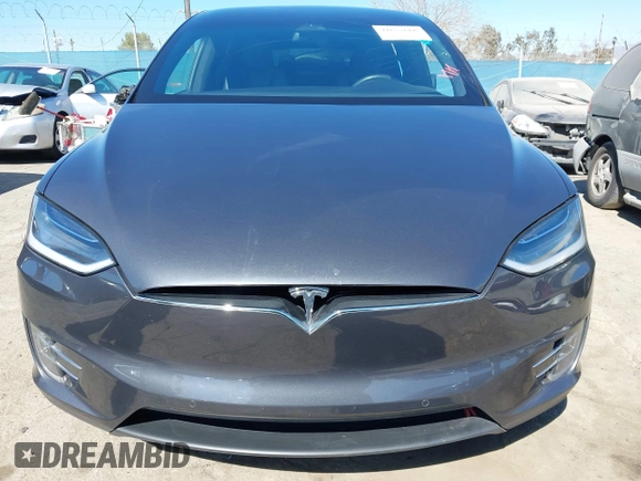 2018 Tesla Model X 75D with VIN 5YJXCBE26JF121937, listed as a IAAI auction lot 41652666 with 93,478 mi miles and . Bid and sale history available at carsss.com. Image 12.
