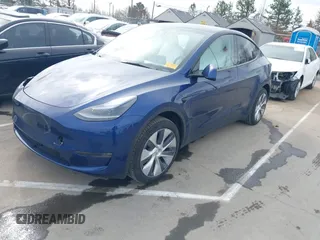 2024 Tesla Model Y Long Range z VIN 7SAYGDEE9RA244657, wystawiony jako IAAI lot #41694621 z przebiegiem 12 991 mil mil oraz . Historia ofert i sprzedaży dostępna na DreamBid. Obrazek 2.
