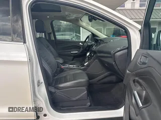 2014 Ford Escape Titanium with VIN 1FMCU9J94EUC63638, listed as a IAAI auction lot 42196241 with 198,112 mi miles and . Bid and sale history available at DreamBid. Image 5.