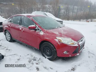 2012 Ford Focus SE with VIN 1FAHP3F26CL390748, listed as a IAAI auction lot 41571211 with 139,807 mi miles. Bid and sale history available at carsss.com. Image 1.