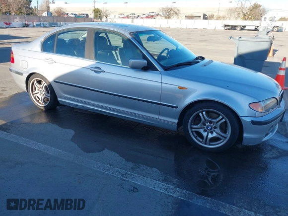 2003 BMW 3 Series 330i with VIN WBAEV53463KM29698, listed as a IAAI auction lot 41528947 with 204,400 mi miles. Bid and sale history available at carsss.com. Image 1.