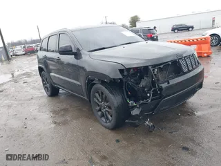 2021 Jeep Grand Cherokee Laredo X with VIN 1C4RJEAG1MC680282, listed as a IAAI auction lot 41466496 with 58,855 mi miles. Bid and sale history available at carsss.com. Image 1.