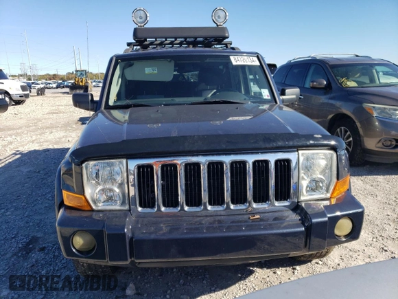 2010 Jeep Commander Sport z VIN 1J4RG4GT8AC139104, wystawiony jako Copart lot #84720134 z przebiegiem 167 646 mil mil oraz Szkoda całkowita • Salvage title. Historia ofert i sprzedaży dostępna na DreamBid. Obrazek 5.