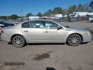 2008 Buick Lucerne CXL with VIN 1G4HD57208U191656, listed as a IAAI auction lot 41973851 with 206,512 mi miles and . Bid and sale history available at DreamBid. Image 13.