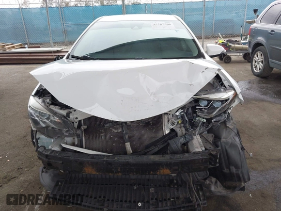 2019 Toyota Corolla L with VIN 5YFBURHE7KP862111, listed as a IAAI auction lot 42205368 with 96,823 mi miles and . Bid and sale history available at DreamBid. Image 13.