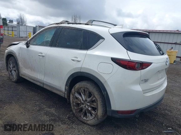 2019 Mazda CX-5 Grand Touring with VIN JM3KFBDM9K0697467, listed as a IAAI auction lot 41940364 with 62,015 mi miles. Bid and sale history available at carsss.com. Image 3.