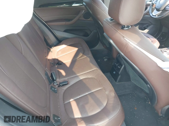2017 BMW X1 xDrive28i with VIN WBXHT3C39H5F84338, listed as a IAAI auction lot 42400168 with 48,673 mi miles and . Bid and sale history available at DreamBid. Image 8.