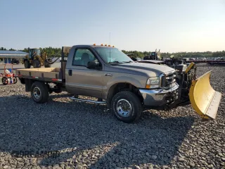 2003 Ford F-250 with VIN 3FTNF21LX3MB28837, listed as a Copart auction lot 69765954 with 97,406 mi miles and Salvage title. Bid and sale history available at DreamBid. Image 4.