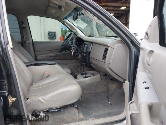 2004 Dodge Dakota SLT z VIN 1D7HG48N94S740006, wystawiony jako IAAI lot #42241181 z przebiegiem 221 192 mil mil oraz . Historia ofert i sprzedaży dostępna na DreamBid. Obrazek 5.