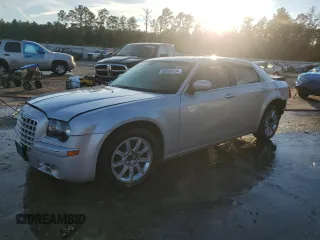 2010 Chrysler 300 with VIN 2C3CA2CV1AH279697, listed as a Copart auction lot 80999824 with 0 mi miles and Salvage Title. Bid and sale history available at carsss.com. Image 1.