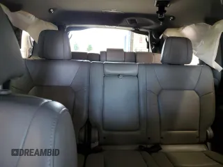 2014 Honda Pilot Touring z VIN 5FNYF4H99EB011079, wystawiony jako Copart lot #57869765 z przebiegiem Nie podano mil oraz Szkoda całkowita • Salvage title. Historia ofert i sprzedaży dostępna na DreamBid. Obrazek 10.