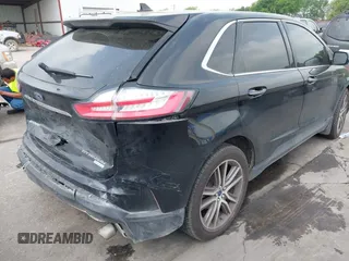 2020 Ford Edge Titanium z VIN 2FMPK3K92LBB24713, wystawiony jako IAAI lot #41949412 z przebiegiem 97 014 mil mil oraz . Historia ofert i sprzedaży dostępna na DreamBid. Obrazek 4.