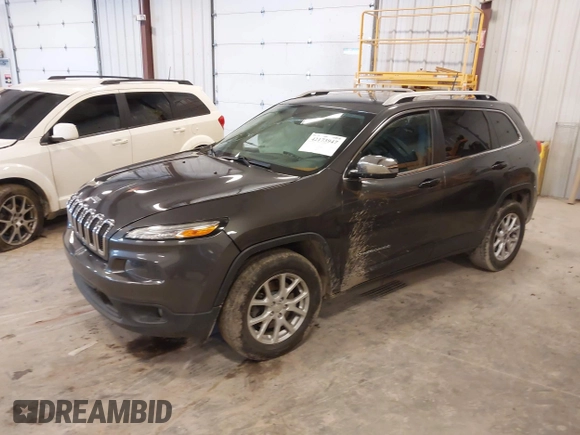 2016 Jeep Cherokee Latitude z VIN 1C4PJMCSXGW147918, wystawiony jako IAAI lot #42173947 z przebiegiem 142 482 mil mil oraz . Historia ofert i sprzedaży dostępna na DreamBid. Obrazek 17.