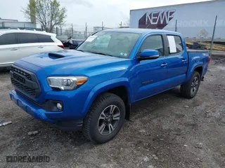 2016 Toyota Tacoma SR with VIN 5TFCZ5AN8GX031900, listed as a IAAI auction lot 41953283 with 166,344 mi miles. Bid and sale history available at carsss.com. Image 20.