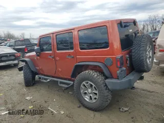 2014 Jeep Wrangler Unlimited Rubicon with VIN 1C4BJWFG0EL187243, listed as a Copart auction lot 45865005 with 53,064 mi miles and Salvage title. Bid and sale history available at DreamBid. Image 2.