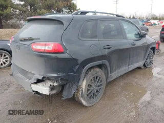2017 Jeep Cherokee Altitude with VIN 1C4PJLAS7HW610189, listed as a IAAI auction lot 41670339 with 116,556 mi miles and . Bid and sale history available at DreamBid. Image 4.