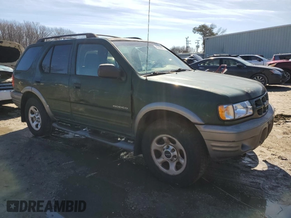 2002 Isuzu Rodeo S z VIN 4S2CK58W724334510, wystawiony jako Copart lot #45355875 z przebiegiem 121 884 mil mil oraz Tytuł czysty. Historia ofert i sprzedaży dostępna na DreamBid. Obrazek 4.