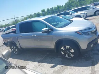 2020 Honda Ridgeline RTL with VIN 5FPYK3F5XLB019296, listed as a IAAI auction lot 42204290 with 48,197 mi miles and . Bid and sale history available at DreamBid. Image 13.