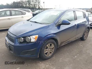 2013 Chevrolet Sonic LT with VIN 1G1JC6SB0D4205841, listed as a IAAI auction lot 41360755 with 137,150 mi miles. Bid and sale history available at carsss.com. Image 2.
