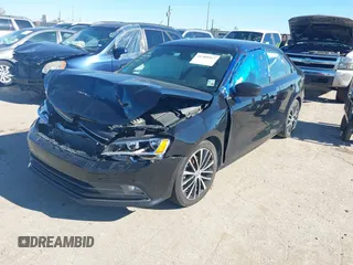 2015 Volkswagen Jetta SE z VIN 3VWD17AJ9FM415626, wystawiony jako IAAI lot #41309967 z przebiegiem 96 681 mil mil oraz . Historia ofert i sprzedaży dostępna na DreamBid. Obrazek 2.