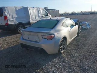 2014 Scion FR-S with VIN JF1ZNAA15E9706119, listed as a IAAI auction lot 41878087 with 98,416 mi miles and . Bid and sale history available at DreamBid. Image 4.