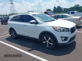 2016 Kia Sorento EX z VIN 5XYPHDA1XGG008732, wystawiony jako IAAI lot #42546431 z przebiegiem 155 098 mil mil oraz . Historia ofert i sprzedaży dostępna na DreamBid. Obrazek 1.