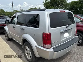 2011 Dodge Nitro SXT z VIN 1D4PT5GK5BW533989, wystawiony jako Copart lot #61019655 z przebiegiem 190 113 mil mil oraz Czysty tytuł • Clean title. Historia ofert i sprzedaży dostępna na DreamBid. Obrazek 3.