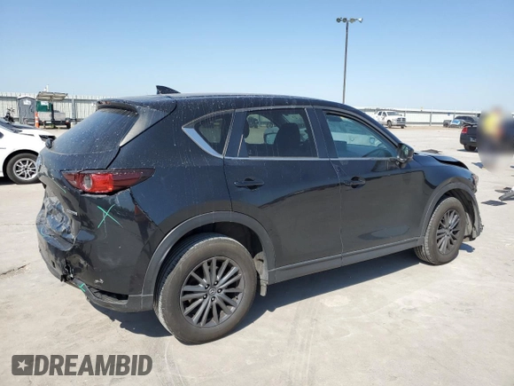 2021 Mazda CX-5 Touring z VIN JM3KFBCM8M0321766, wystawiony jako Copart lot #52845085 z przebiegiem 115 627 mil mil oraz Szkody całkowita. Historia ofert i sprzedaży dostępna na DreamBid. Obrazek 3.