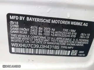 2018 BMW X1 sDrive28i with VIN WBXHU7C39J3H43185, listed as a IAAI auction lot 41798183 with 51,666 mi miles. Bid and sale history available at carsss.com. Image 9.