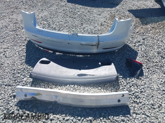 2018 Tesla Model 3 Long Range Battery with VIN 5YJ3E1EA7JF020173, listed as a IAAI auction lot 42046312 with 83,395 mi miles and . Bid and sale history available at DreamBid. Image 12.