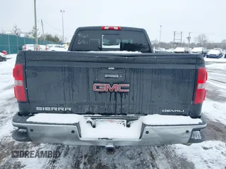 2014 GMC Sierra 1500 Denali z VIN 3GTU2WEC9EG310426, wystawiony jako IAAI lot #41616941 z przebiegiem 115 808 mil mil oraz . Historia ofert i sprzedaży dostępna na DreamBid. Obrazek 16.