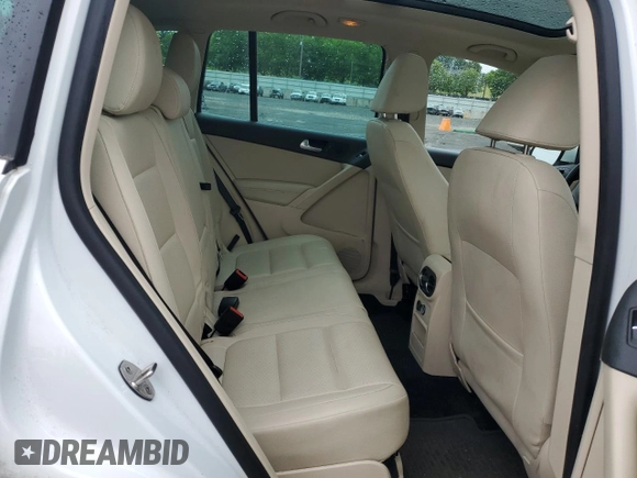 2017 Volkswagen Tiguan Wolfsburg Edition with VIN WVGRV7AX0HK003389, listed as a Copart auction lot 59709615 with 88,491 mi miles and Salvage title. Bid and sale history available at DreamBid. Image 11.