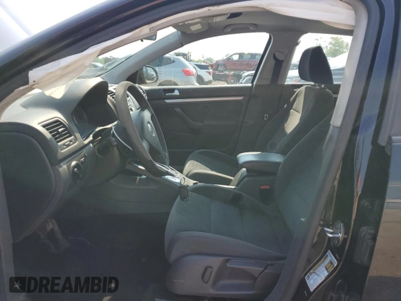 2009 Volkswagen Jetta S with VIN 3VWJM71K69M154382, listed as a Copart auction lot 60513215 with 193,278 mi miles and Salvage title. Bid and sale history available at DreamBid. Image 7.