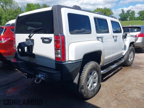 2007 Hummer H3 SUV with VIN 5GTDN13E978105558, listed as a IAAI auction lot 42175911 with 126,439 mi miles and . Bid and sale history available at DreamBid. Image 4.