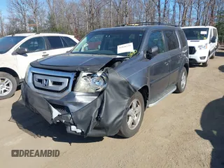 2011 Honda Pilot EX-L with VIN 5FNYF4H69BB015375, listed as a IAAI auction lot 41826235 with 199,171 mi miles and . Bid and sale history available at carsss.com. Image 2.